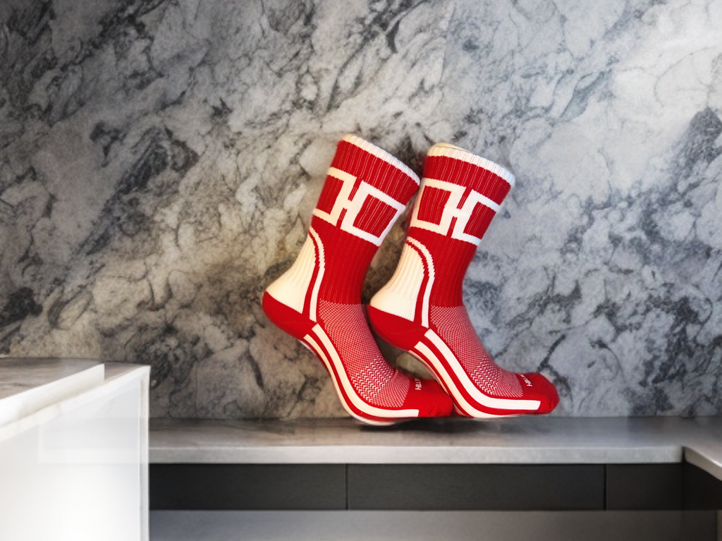 Red and white Hill Toe work sock inspired by the Detroit hockey culture, with breathable mesh and arch support.