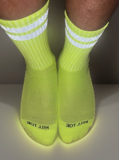 Hill Toe neon nylon socks with reflective material, breathable for runners and bikers.