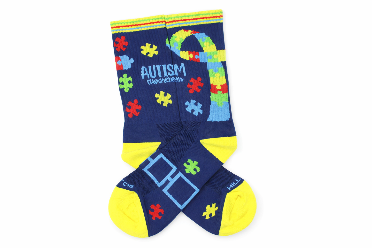 Colorful socks with autism awareness design on a white background